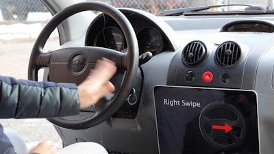Researchers at Carnegie Mellon University's Human-Computer Interaction Institute have developed a low-cost method of turning a wide variety of surfaces into touchpads, such as this steering wheel.