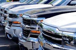 Chevrolet trucks are lined up at a Chevrolet dealership in Richmond, Va. Analysts expect the auto industry to post a fourth straight month of lower sales as the pace of sales cools after last year's record.