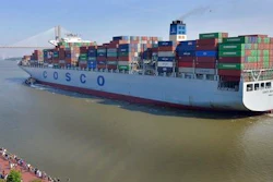 A crowd of well-wishers along River Street welcome the container ship COSCO Development, Thursday morning, May 11, 2017, in Savannah, Ga, as the vessel sails up the Savannah River to the Port of Savannah. The ship is the largest vessel ever to call on the U.S. East Coast.