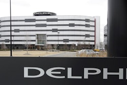 In this March 22, 2006, file photo, Delphi's World Headquarters is shown in Troy, Mich. Automotive parts and electronics maker Delphi Corp. is the latest partner to join BMW, Intel and Mobileye to develop autonomous vehicles. The companies announced Tuesday, May 16, 2017, that Delphi will work with the companies to integrate autonomous driving systems. They plan to have a self-driving system ready by 2021.