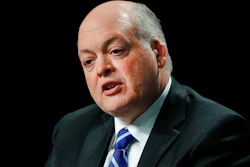 In this Monday, May 22, 2017, file photo, Jim Hackett speaks after being introduced as Ford Motor Company CEO, in Dearborn, Mich. Hackett revealed a little about his plans, and a lot about himself, when he talked to media after his appointment. 'The number one vehicle in the world is built by Ford Motor Company, and that’s not lost on me,' said Hackett.