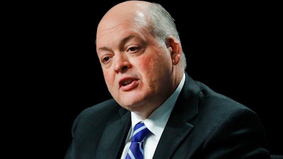 In this Monday, May 22, 2017, file photo, Jim Hackett speaks after being introduced as Ford Motor Company CEO, in Dearborn, Mich. Hackett revealed a little about his plans, and a lot about himself, when he talked to media after his appointment. 'The number one vehicle in the world is built by Ford Motor Company, and that’s not lost on me,' said Hackett.
