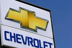 In this July 8, 2012 file photo, the Chevrolet logo is seen at an auto dealership in Springfield, Ill. General Motors Co. is pulling its Chevrolet brand out of India, South Africa and East Africa by the end of 2017. The company will retain its assembly plant in India but will only make vehicles for export. It is selling a plant in South Africa to Isuzu Motors.