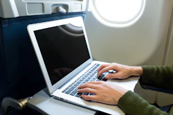 Laptop On Plane I Stock 623826556 591f073695571
