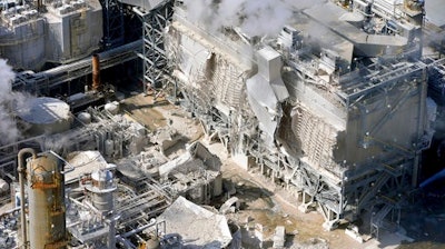 FILE - This Feb. 18, 2015, file photo shows a structure damaged after an explosion in a processing facility at a refinery in Torrance, Calif. A federal safety board says the 2015 explosion was preventable and is recommending changes to its safety procedures.