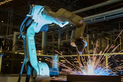 Robot Welding In An Auto Factory 590c9ba1060cc