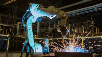 Robot Welding In An Auto Factory 590c9ba1060cc