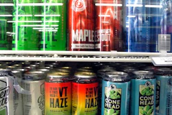 Different varieties of Vermont craft beer sit in a store cooler at Mehuron's Market on Tuesday, May 9, 2017, in Waitsfield, Vt. Vermont brewers have a message for the rest of the industry: don't go describing a brew as a Vermont beer if it's not from the Green Mountains.