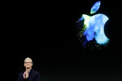 n this Oct. 27, 2016, file photo, Apple CEO Tim Cook speaks during an announcement of new products in Cupertino, Calif. Apple will invest $1 billion to help create more U.S. manufacturing jobs and counter recurring criticism about its reliance on overseas factories to assemble most of its iPhones and other devices.