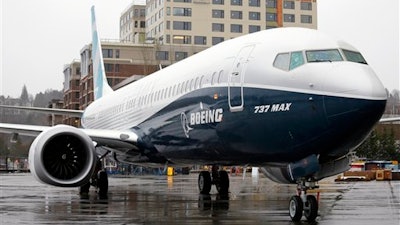 In this March 7, 2017, file photo, the first of the large Boeing 737 MAX 9 models, Boeing's newest commercial airplane, sits outside its production plant in Renton, Wash.