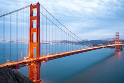 The Golden Gate Bridge is a suspension bridge, meaning it relies on cables and suspenders under tension along with towers under compression to cross a long distance without any intermediate supports.