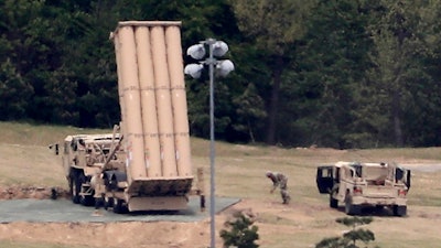 In this May 2, 2017, file photo, a U.S. missile defense system called Terminal High Altitude Area Defense, or THAAD, is installed on a golf course in Seongju, South Korea.