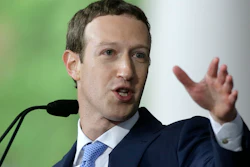 Facebook CEO and Harvard dropout Mark Zuckerberg delivers the commencement address at Harvard University commencement exercises, Thursday, May 25, 2017, in Cambridge, Mass.
