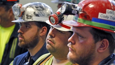 Coal miners in Pennsylvania in April listen to Scott Pruitt, head of the Environmental Protection Agency.