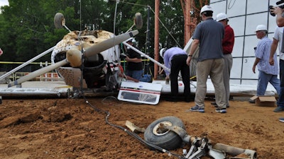 NASA's Search and Rescue office performed three controlled plane crashes at the agency's Langley Research Center in Hampton, Virginia, to evaluate the performance of current emergency locator transmitter (ELT) systems and make recommendations for improvements.