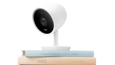 This photo provided by Nest Labs shows the Nest Cam IQ. Nest Labs is adding Google's facial recognition technology to a high-resolution security camera that will provide a glimpse at the potential for increasingly intelligent, internet-connected computers to see and understand everything going on in people's homes.
