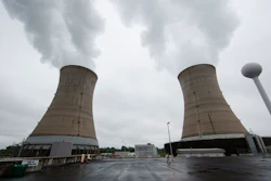 A Monday, May 22, 2017 file photo shows cooling towers at the Three Mile Island nuclear power plant in Middletown, Pa. Exelon Corp., the owner of Three Mile Island, site of the United States' worst commercial nuclear power accident, said Monday, May 29, 2017 it will shut down the plant in 2019 without a financial rescue from Pennsylvania.