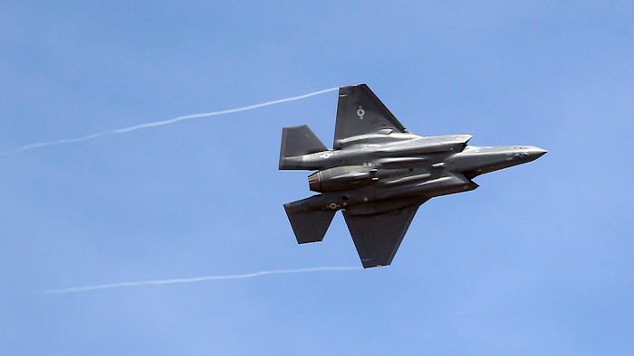 In this Wednesday, Sept. 2, 2015, file photo, an F-35 jet arrives at its new operational base at Hill Air Force Base, in northern Utah. Airbus and Boeing will again hog the spotlight at the Paris Air Show with their battle for ever-larger slices of the lucrative pie in the sky.