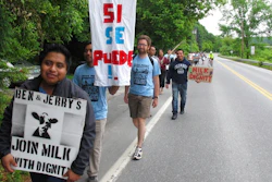 Scores of dairy farm workers and activists marching in Montpelier, Vt., on Saturday June, 17, 2017. They were marching to the main Ben & Jerry's factory in the Vermont town of Waterbury to protest what they feel are slow negotiations to reach a deal on their 'Milk with Dignity' program that would ensure fair wages and living conditions. Ben & Jerry's spokesman Sean Greenwood says the company is committed to reaching a deal with workers.