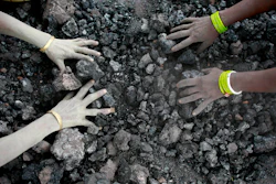 In this Monday, Dec. 14, 2015, file photo, Indian women use bare hands to pick reusable pieces from heaps of used coal discarded by a carbon factory in Gauhati, India. The world’s biggest coal users - China, the United States and India - have boosted coal mining in 2017, in an abrupt departure from last year’s record global decline for the heavily polluting fuel and a setback to efforts to rein in climate change emissions.