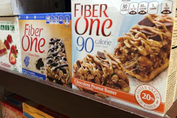 In this Tuesday, June 13, 2017, photo, Fiber One bars sit on a shelf at a market, in New York. Snack bars, cereals and brownies with added fiber may not appear as filling under a new labeling rule. A little-discussed aspect of the revamped Nutrition Facts panel, which was postponed Tuesday, June 13, is that it could change what ingredients products like Fiber One bars can count as dietary fiber. The unsettled details are partly why the industry has called for delaying the deadline to use the new panel.