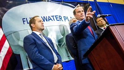 Michigan Attorney General Bill Schuette announces charges Wednesday, June 14, 2017, in Flint, Mich. Five people, including the head of Michigan's health department, were charged Wednesday with involuntary manslaughter in an investigation of Flint's lead-contaminated water, all blamed in the death of an 85-year-old man who had Legionnaires' disease.