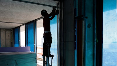 In this photo, a construction worker continues work at the SLS Lux in the Brickell neighborhood of Miami. Exactly eight years after the Great Recession ended, the U.S. job market has settled into a sweet spot of steadily solid growth.