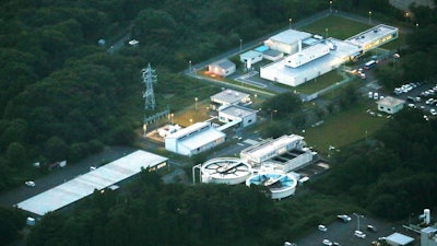 This Tuesday, June 6, 2017 photo shows Oarai Research & Development Center, a facility for nuclear fuel study that uses highly toxic plutonium. Japan's Atomic Energy Agency says five workers at the nuclear facility that handles plutonium have been exposed to high levels of radiation after a bag containing highly radioactive material broke during equipment inspection.