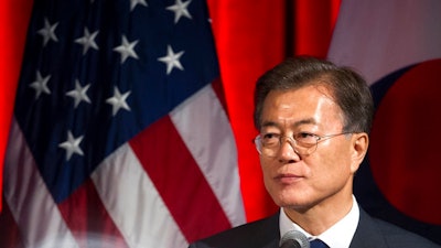 South Korean President Moon Jae-in speaks at a dinner hosted by the U.S. Chamber of Commerce and the South Korean Chamber of Commerce in Washington, Wednesday, June 28, 2017.