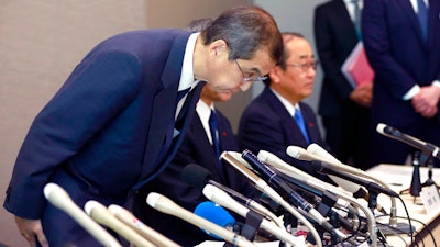 Japanese air bag maker Takata Corp. CEO Shigehisa Takada bows during a press conference in Tokyo, Monday, June 26, 2017. Takata has filed for bankruptcy protection in Tokyo and the U.S., overwhelmed by lawsuits and recall costs related to its production of defective air bag inflators.