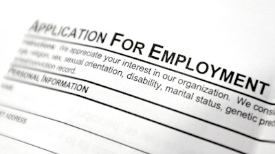 This April 22, 2014, file photo shows an employment application form on a table during a job fair at Columbia-Greene Community College in Hudson, N.Y. On Thursday, June 8, 2017, the Labor Department reports on the number of people who applied for unemployment benefits a week earlier.