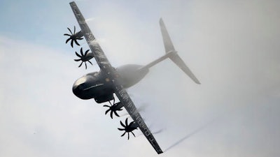 In this May 12 2015 file photo, an Airbus A400M aircraft lands in the Seville airport, Spain.