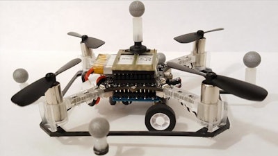 A quadcopter drone with wheels.