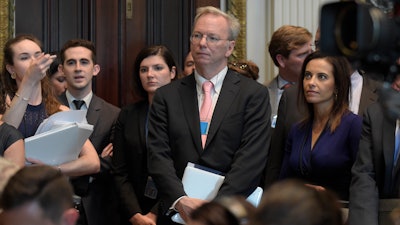 Alphabet Inc Executive Chairman Eric Schmidt, center, listens as White House senior adviser Jared Kushner speaks at the opening session of the White House meeting with technology Chief Executive Officers to mark 'technology week,' Monday, June 19, 2017, in the Indian Treat Room of the Eisenhower Executive Office Building on the White House complex in Washington. The White House Office of American Innovation is hosting a series of working sessions to generate ideas to transform and modernize Government Services.