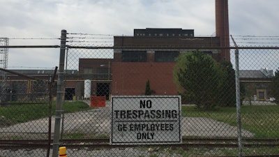 This May 24, 2017 photo shows the General Electric manufacturing facility in Peterborough, Ontario, Canada. For more than a decade, several hundred retirees from this plant, which produced engines for trains and ships among other things, have claimed illnesses linked to exposure to toxins inside the factory. Now, they may soon get the compensation they have sought from the provincial government, following Ontario Labor Minister Kevin Flynn publicly calling on the worker's compensation board to 'bring justice' to about 300 former workers whose health claims were previously denied.