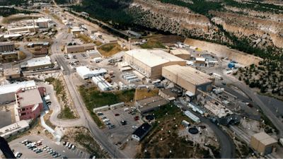 This undated aerial view shows the Los Alamos National laboratory in Los Alamos, N.M. The competition for a multibillion-dollar contract to manage the troubled Los Alamos National Laboratory is beginning after a week in which the northern New Mexico facility was hit with criticism for its record of safety lapses.