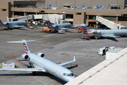 At Phoenix Sky Harbor International Airport American Airlines regional jets sit on the tarmac as American Airlines says seven regional flights have been delayed and 43 have been canceled because of a heat wave as temperatures climb to near-record highs Tuesday, June 20, 2017, in Phoenix.