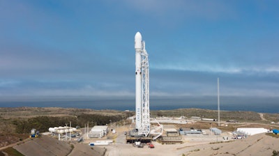 In this Sunday, June 25, 2017, photo released by SpaceX, a SpaceX Falcon 9 rocket is seen before lift off Sunday, carrying 10 more satellites for Iridium Communications, from Vandenberg Air Force Base, Calif. SpaceX has succeeded in landing a Falcon 9 first-stage booster on a vessel in the Pacific after a launch from California. The rocket lifted off from Vandenberg Air Force Base at 1:25 p.m. Sunday. It was carrying 10 satellites for Iridium Communications. The first-stage booster landed about 7 minutes later. The Falcon's second stage is continuing to carry the satellites toward orbit.