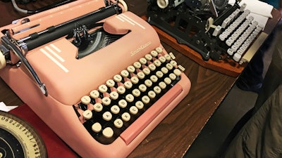 In this April 23, 2017 photo, vintage typewriters are on display at a 'type-in' in Albuquerque, N.M. 'Type-ins' are social gatherings in public places where typewriter fans test different vintage machines. The vintage typewriter is making a comeback with a new generation of fans gravitating to machines that once gathered dust in attics and basements across the country.