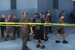 UPS workers gather outside after a reported shooting at a UPS warehouse and customer service center in San Francisco on Wednesday, June 14, 2017. San Francisco police confirmed a shooting at the facility in the Potrero Hill neighborhood but didn’t release information on injuries or the shooter.