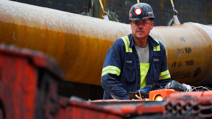 In this Wednesday, June 7, 2017, file photo, a miner works at a coal mine in Friedens, Pa. On Friday, July 14, 2017, the Federal Reserve reports on U.S. industrial production for June.