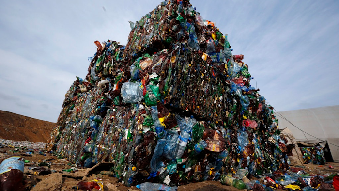 In this March 12, 2015 file photo, plastic trash is compacted into bales ready for further processing at the waste processing dump on the outskirts of Minsk, Belarus. A new massive study finds that production of plastic and the hard-to-breakdown synthetic waste is soaring in huge numbers. The study says since 1950, industry has made more than 9 billion tons of plastics. That’s enough to cover the entire country of Argentina ankle deep in the stuff.