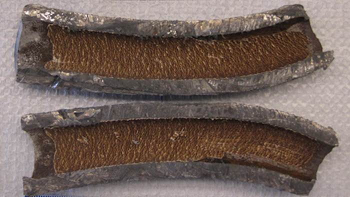 Inside a Flint lead service line. University of Michigan researchers have closely examined the rust layer to confirm that the cause of the water crisis was, indeed, a lack of corrosion-controlling chemicals in the water.