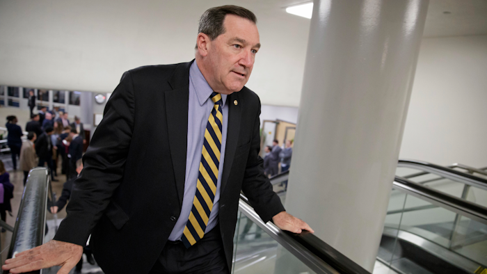 U.S. Sen. Joe Donnelly, D-Ind railed against Carrier Corp. for moving manufacturing jobs to Mexico last year, even while he profited from a family business that relies on Mexican labor to produce dye for ink pads, according to records reviewed by The Associated Press.