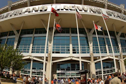 In this Sunday, Sept. 13, 2009 file photo, fans walk into Cleveland Browns Stadium before the Minnesota Vikings play the Cleveland Browns in an NFL football game, in Cleveland. In sales brochures, a U.S. company boasted of the 'stunning visual effect' its shimmering aluminum panels created in an NFL stadium, an Alaskan school and a 33-story hotel on Baltimore's waterfront.