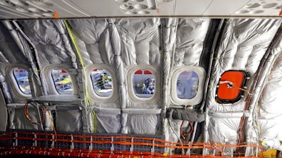 In this Monday, Feb. 13, 2017, file photo, work continues on the interior of the first of the large Boeing 737 MAX 9 models as it sits at the front of the assembly line and almost ready to roll out at the company's airplane production facility, in Renton, Wash. On Monday, July 3, 2017, the Institute for Supply Management releases its manufacturing index for June.