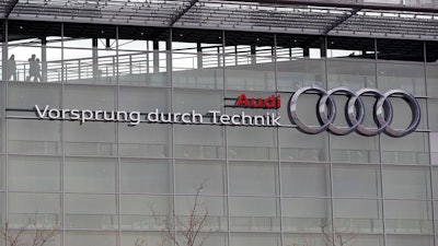 In this Wednesday, March 15, 2017 file photo, the four ring logo of German car producer Audi is photographed at the headquarters after the annual press conference in Ingolstadt, Germany. German automaker Audi says it will fit up to 850,000 diesel cars with new software to improve their emissions performance, following a similar move by rival Daimler as the auto industry tries to get ahead of public controversy over the technology. Audi, the luxury brand of the Volkswagen Group, announced the voluntary retrofitting program on Friday, July 21, 2017.