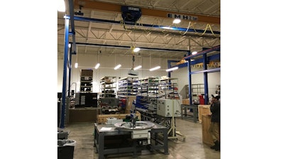 NOMAD Free Standing Cranes enable WEISS operators to easily move rotary indexing chassis components between workstations during assembly.