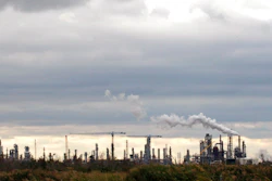 IN this Dec. 2, 2009, file photo, the Total Port Arthur refinery is shown in Port Arthur, Texas. Federal lawsuits against the U.S. Environmental Protection Agency were filed claiming the agency has failed to correct Texas air pollution control permits with loopholes that make state enforcement rare. The suits filed Thursday, July 20, 2017, by the nonprofit Washington, D.C.-based Environmental Integrity Project, target permits for the largest integrated petrochemical factory in the U.S., three refineries near the Houston Ship Channel including the largest petroleum refinery in the U.S. and a coal-fired power plant east of Dallas.