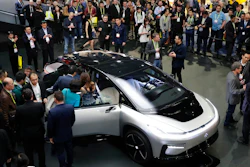 In this Jan. 3, 2017, file photo, Faraday Future's FF 91 electric car is unveiled during a news conference at CES International in Las Vegas. Electric car maker Faraday Future said Monday, July 10, 2017 that it is deserting its plan to construct a $1 billion manufacturing plant in southern Nevada eight months after suspending the project and sinking at least $120 million into it.